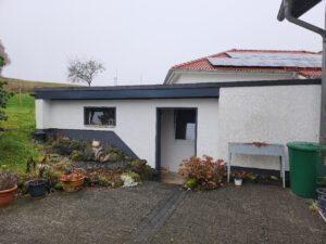 Garagenverlängerung Holzschuppen